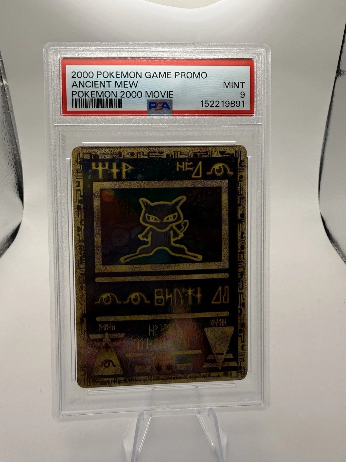 Ancient Mew, front of the graded card with its grade redacted